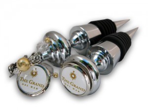 Wine Bottle stoppers with Custom Grand Del Mar charms and logos