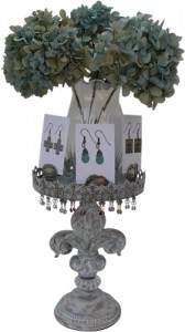 Vintage Fleur de Lis Stand to display Classic Legacy earrings topped with dried hydrangea
