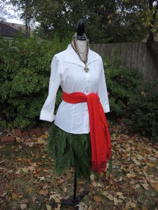The Mannequin Evergreen Tree Skirt uses the Red Scarf at waist.