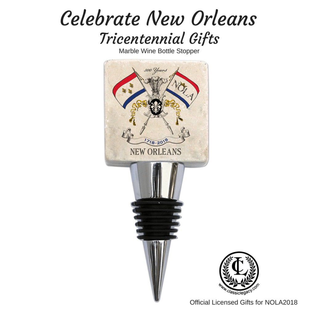 New Orleans Tricentennial Gifts include this marble wine bottle stopper with the NOLA2018 logo.