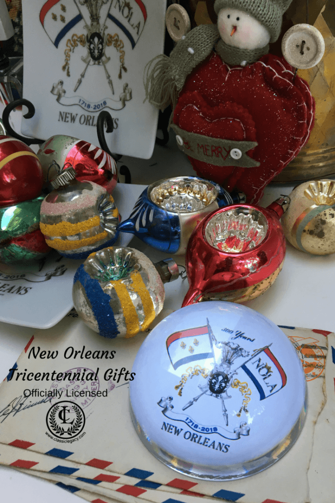 NOLA2018 Tricentennial gifts include crystal domed paperweight for Christmas