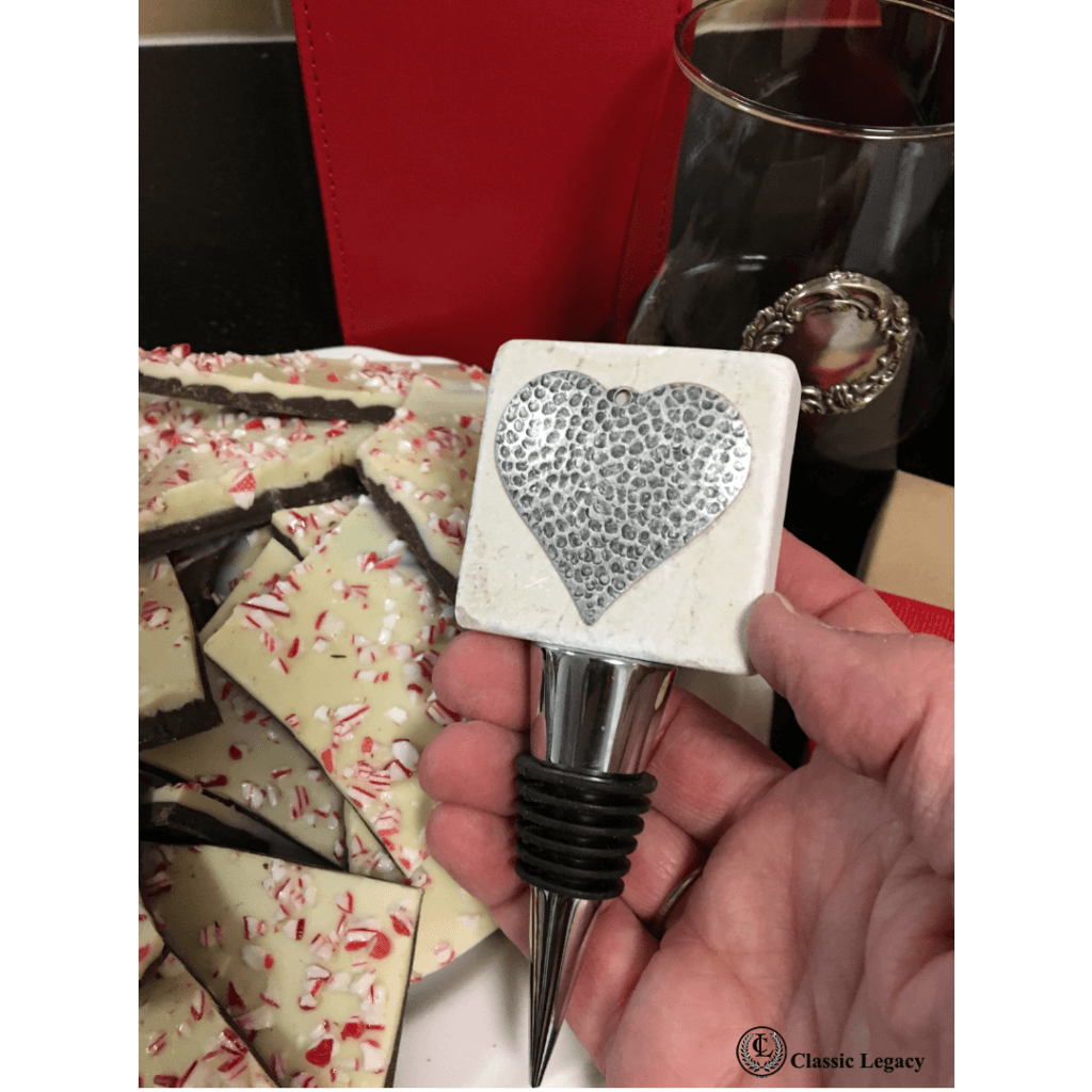 Heart gifts include marble wine bottle stopper with silver hammered heart