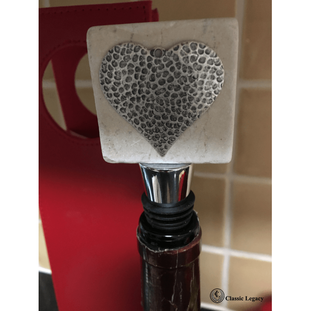 Heart gifts include marble wine bottle stopper with silver hammered heart