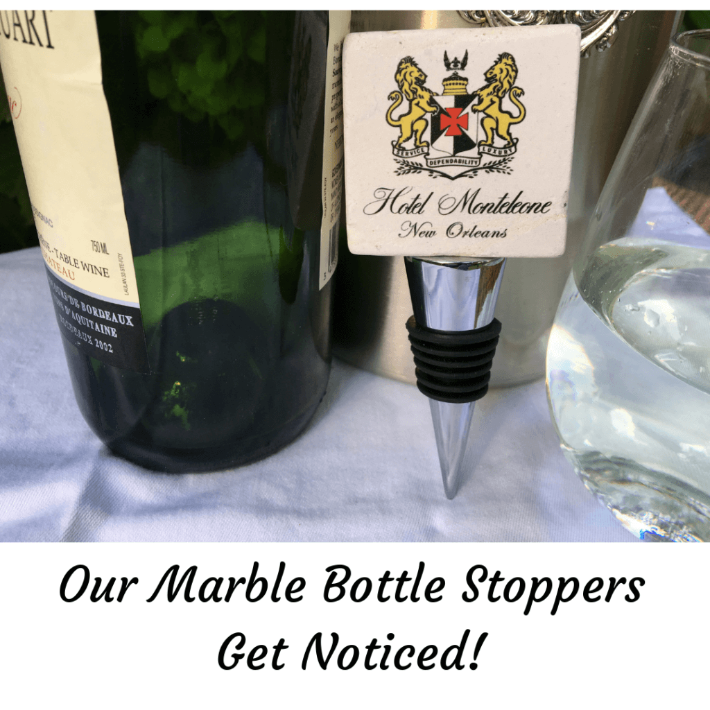 Custom marble wine bottle stopper with Hotel Monteleone logo