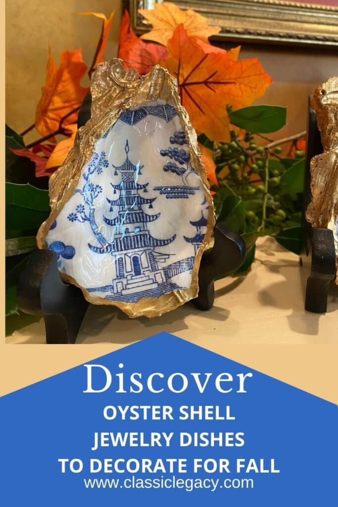 Oyster shell jewelry dish blue and white with fall decor.